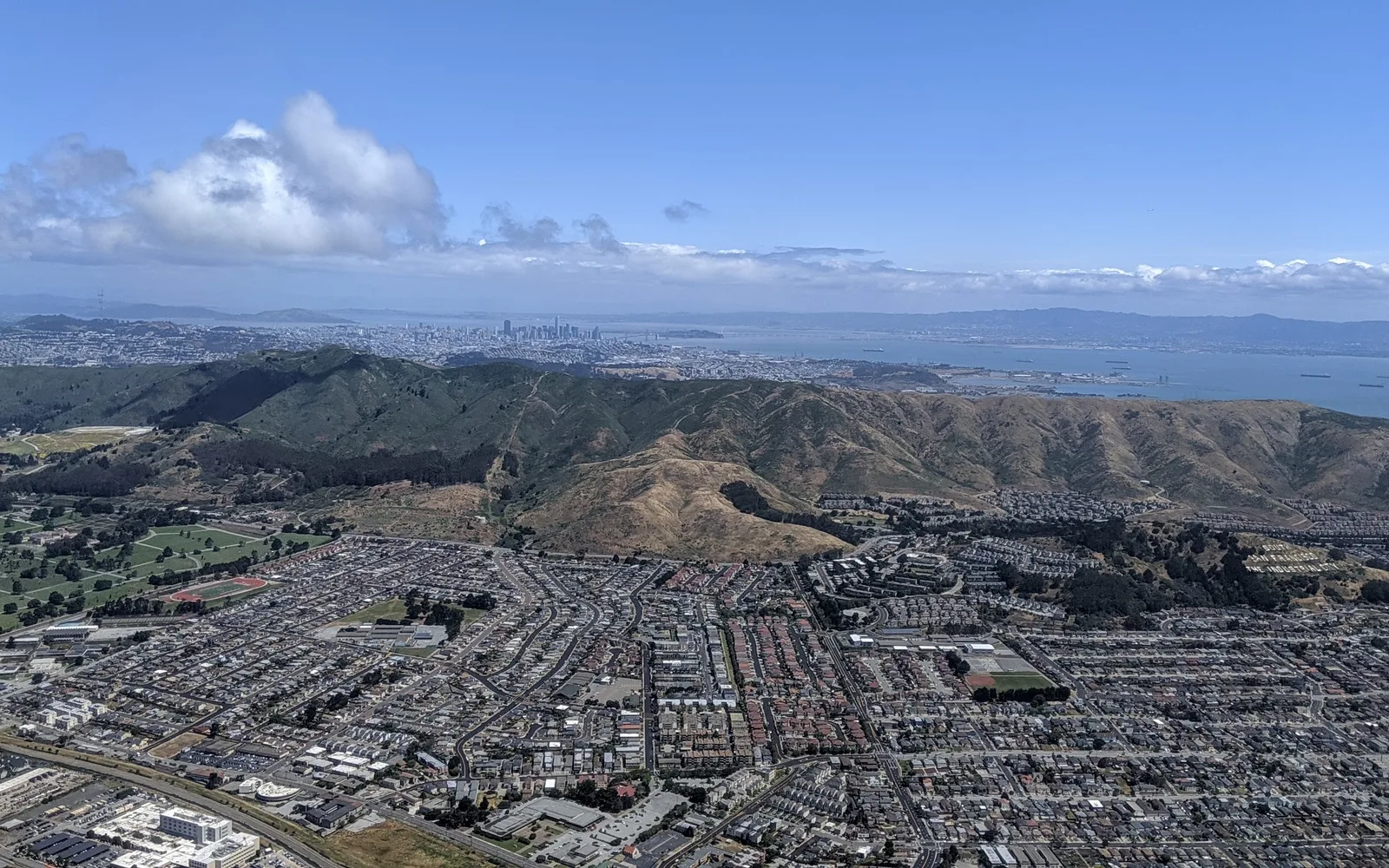Aerial view of South San Francisco and San Bruno Mountain taken from departing aircraft